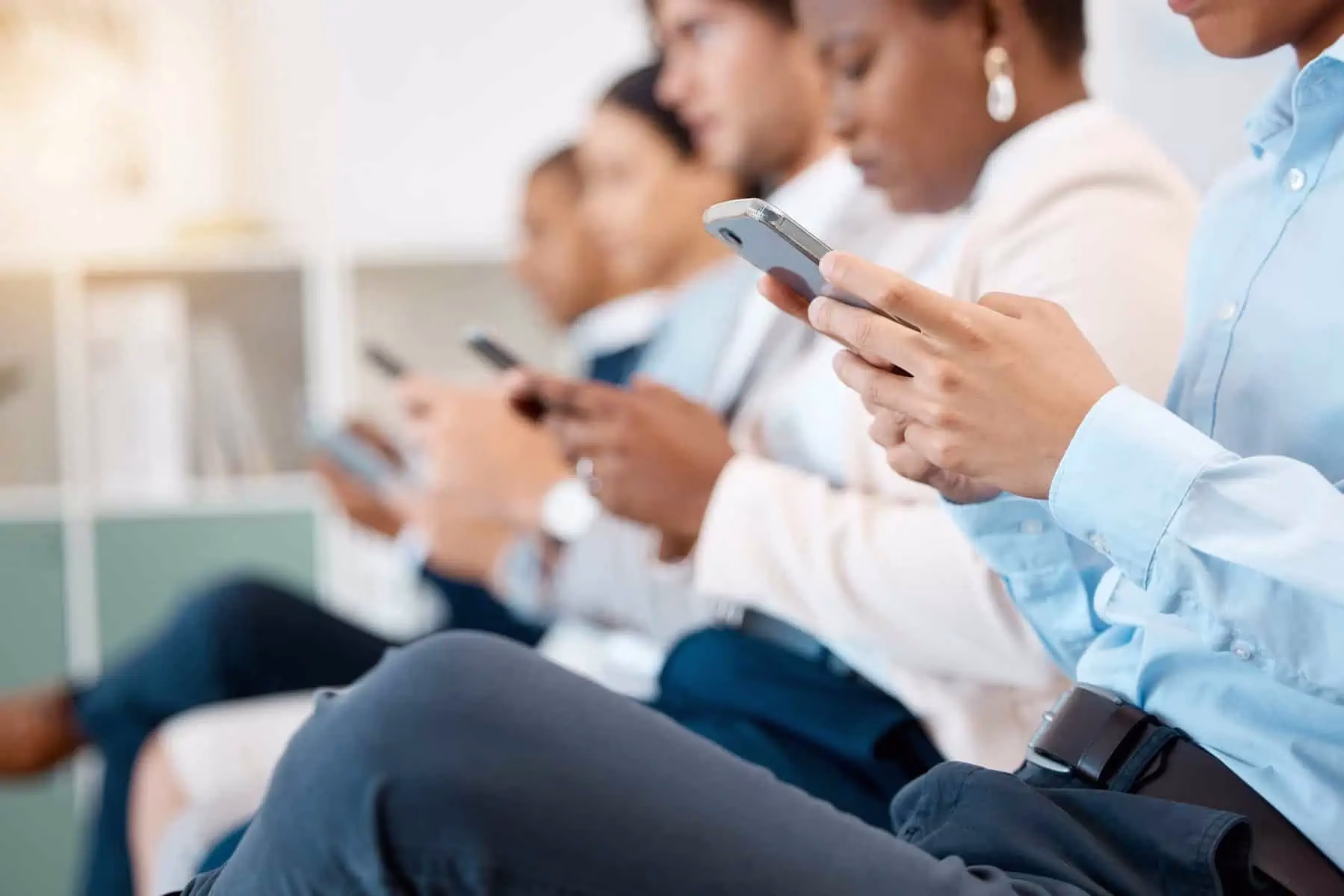 Team engaging with Facebook Ads on mobile devices